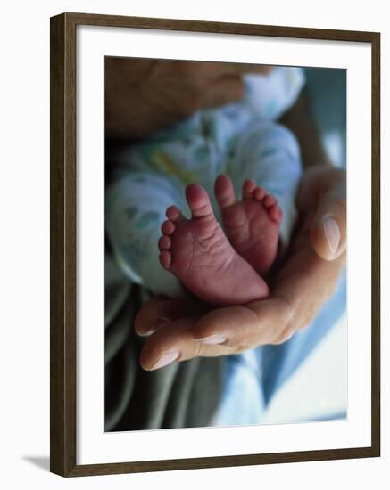 A Father Holding His Baby's Feet-Mitch Diamond-Framed Photographic Print