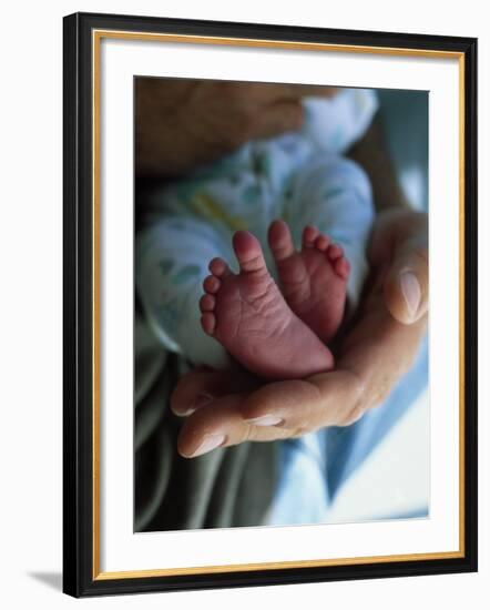 A Father Holding His Baby's Feet-Mitch Diamond-Framed Photographic Print