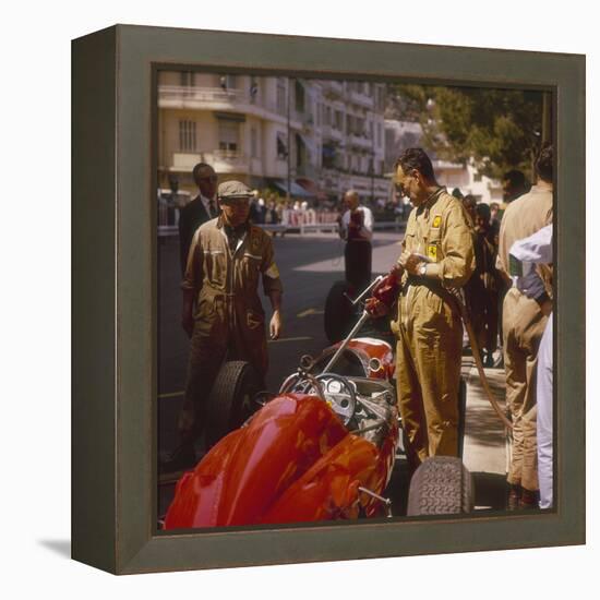 A Ferrari Team Member Filling a Car with Fuel, Monaco Grand Prix, Monte Carlo, 1963-null-Framed Premier Image Canvas