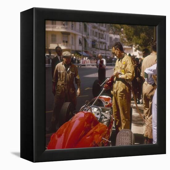 A Ferrari Team Member Filling a Car with Fuel, Monaco Grand Prix, Monte Carlo, 1963-null-Framed Premier Image Canvas