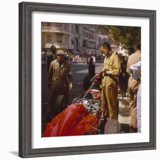 A Ferrari Team Member Filling a Car with Fuel, Monaco Grand Prix, Monte Carlo, 1963-null-Framed Photographic Print