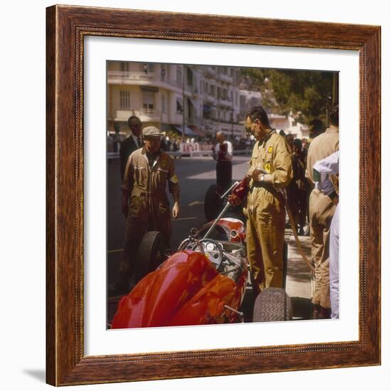 A Ferrari Team Member Filling a Car with Fuel, Monaco Grand Prix, Monte Carlo, 1963-null-Framed Photographic Print