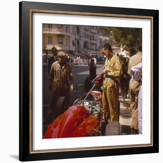 A Ferrari Team Member Filling a Car with Fuel, Monaco Grand Prix, Monte Carlo, 1963-null-Framed Photographic Print