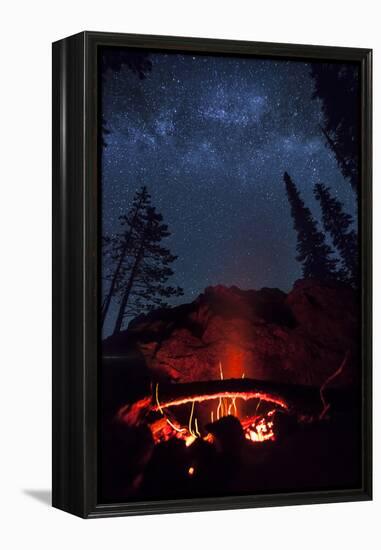 A Fire Burns under a Canopy of Stars and Evergreens in the Seven Devil Mountains in Central Idaho-Ben Herndon-Framed Premier Image Canvas