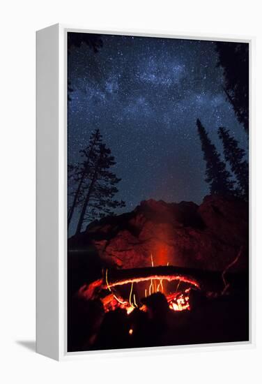 A Fire Burns under a Canopy of Stars and Evergreens in the Seven Devil Mountains in Central Idaho-Ben Herndon-Framed Premier Image Canvas