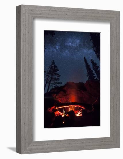 A Fire Burns under a Canopy of Stars and Evergreens in the Seven Devil Mountains in Central Idaho-Ben Herndon-Framed Photographic Print