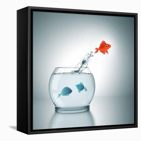 A Fishbowl With A Red Fish Jumping Out Of The Water-magann-Framed Premier Image Canvas