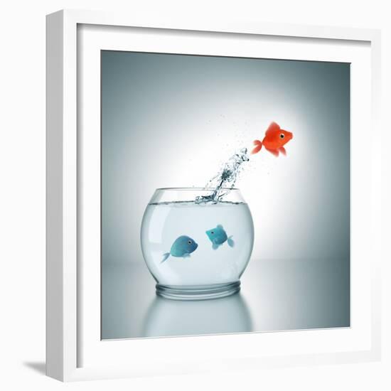 A Fishbowl With A Red Fish Jumping Out Of The Water-magann-Framed Photographic Print