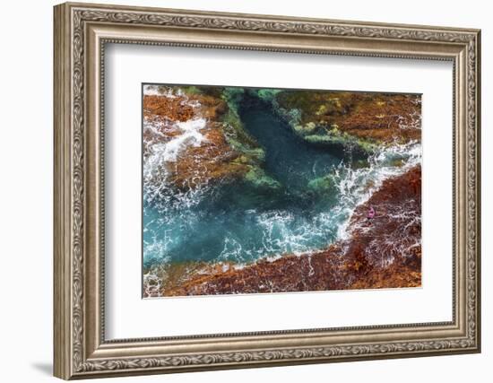 A fisherman fishes a Beryx splendens down a cliff in Fuerteventura island, Canary Islands, Spain, A-David Rocaberti-Framed Photographic Print