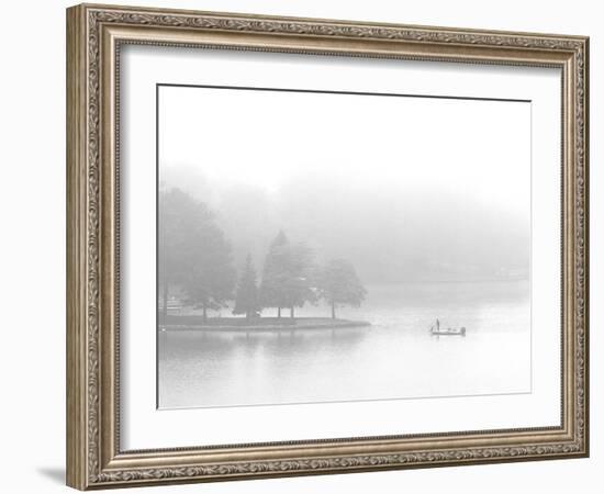 A Fisherman Fishes off the Point of a Peninsula-null-Framed Photographic Print