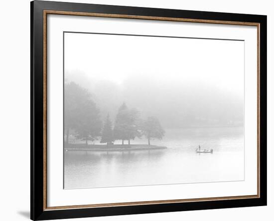 A Fisherman Fishes off the Point of a Peninsula-null-Framed Photographic Print