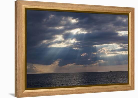 A Fishing Trawler under Storm Clouds at Duck Harbor Beach in Wellfleet, Massachusetts. Cape Cod-Jerry and Marcy Monkman-Framed Premier Image Canvas