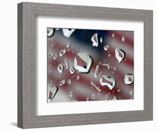 A Flag at a Lawrence, Kan., Restaurant is Refracted in Rain Drops on a Car Window-null-Framed Photographic Print