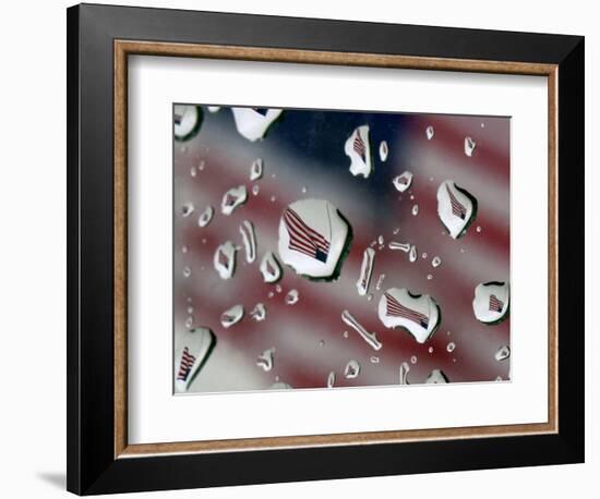 A Flag at a Lawrence, Kan., Restaurant is Refracted in Rain Drops on a Car Window-null-Framed Photographic Print