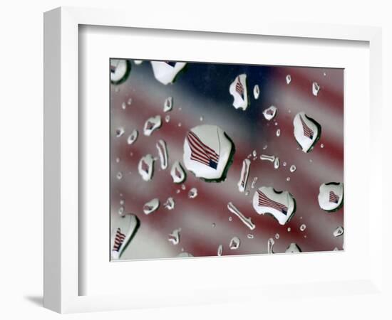 A Flag at a Lawrence, Kan., Restaurant is Refracted in Rain Drops on a Car Window-null-Framed Photographic Print