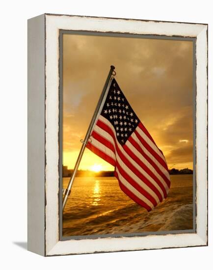 A Flag Waves Over Pearl Harbor as Dawn Breaks-null-Framed Premier Image Canvas