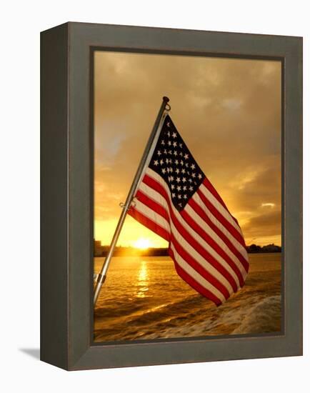 A Flag Waves Over Pearl Harbor as Dawn Breaks-null-Framed Premier Image Canvas