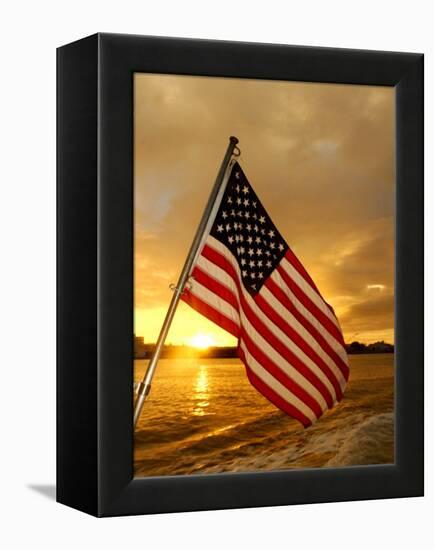 A Flag Waves Over Pearl Harbor as Dawn Breaks-null-Framed Premier Image Canvas