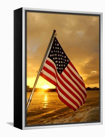 A Flag Waves Over Pearl Harbor as Dawn Breaks-null-Framed Premier Image Canvas