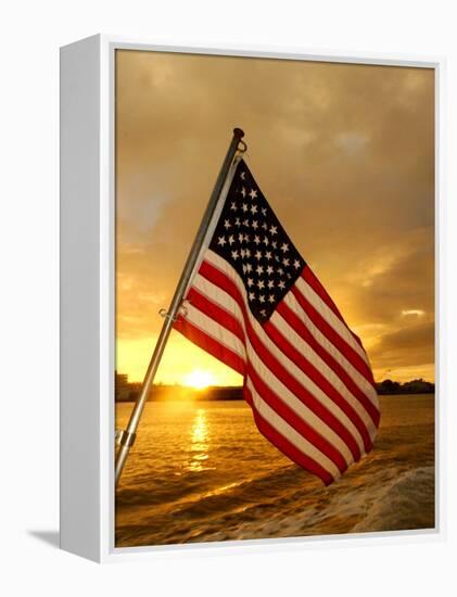 A Flag Waves Over Pearl Harbor as Dawn Breaks-null-Framed Premier Image Canvas