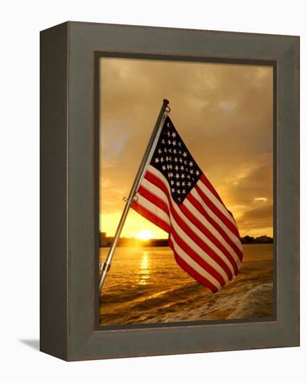 A Flag Waves Over Pearl Harbor as Dawn Breaks-null-Framed Premier Image Canvas