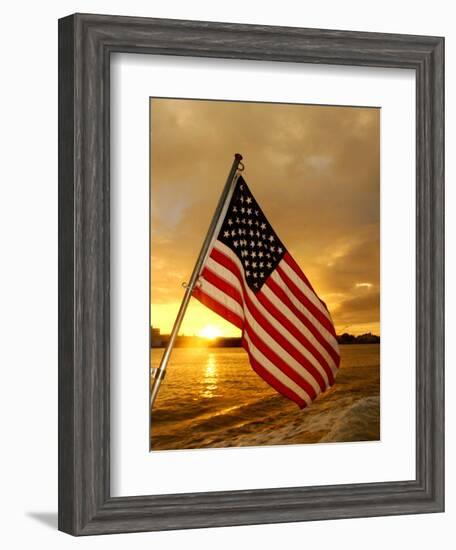 A Flag Waves Over Pearl Harbor as Dawn Breaks-null-Framed Photographic Print