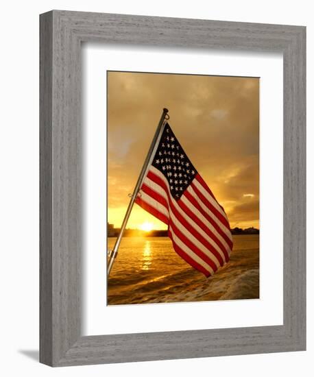 A Flag Waves Over Pearl Harbor as Dawn Breaks-null-Framed Photographic Print