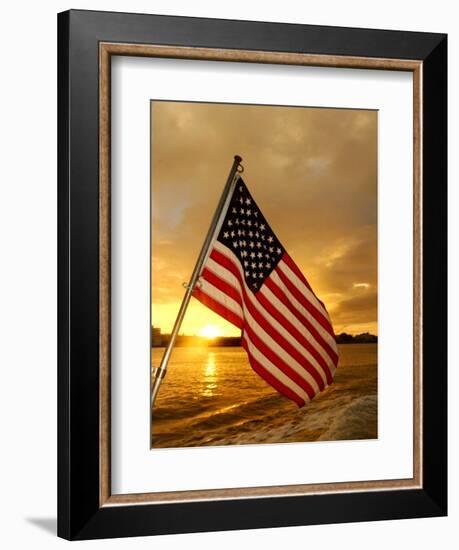 A Flag Waves Over Pearl Harbor as Dawn Breaks-null-Framed Photographic Print