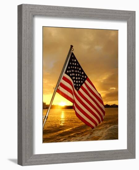 A Flag Waves Over Pearl Harbor as Dawn Breaks-null-Framed Photographic Print
