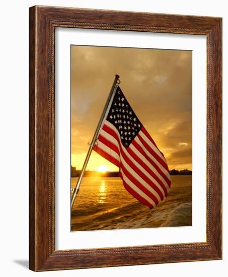 A Flag Waves Over Pearl Harbor as Dawn Breaks-null-Framed Photographic Print