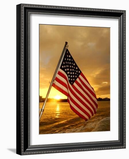 A Flag Waves Over Pearl Harbor as Dawn Breaks-null-Framed Photographic Print