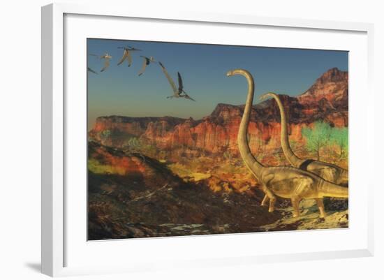 A Flock of Pterosaurs Fly Past Two Omeisaurus Dinosaurs-Stocktrek Images-Framed Art Print