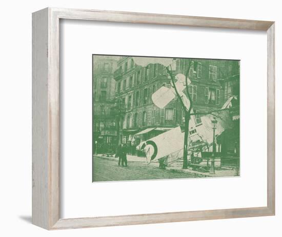 A French aeroplane descends in a Paris street, c1917 (1919)-Unknown-Framed Photographic Print