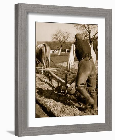 A German Farmer at Work-German photographer-Framed Giclee Print