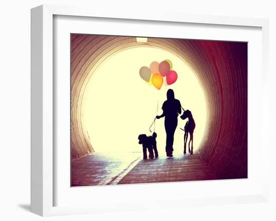 A Girl at the End of a Tunnel Holding Balloons and Two Dogs Done with an Instagram Vintage Retro Fi-graphicphoto-Framed Photographic Print