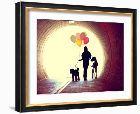 A Girl at the End of a Tunnel Holding Balloons and Two Dogs Done with an Instagram Vintage Retro Fi-graphicphoto-Framed Photographic Print