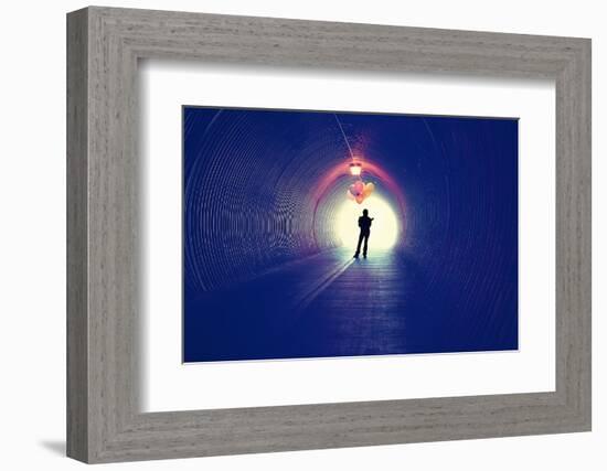 A Girl at the End of a Tunnel Holding Balloons-graphicphoto-Framed Photographic Print