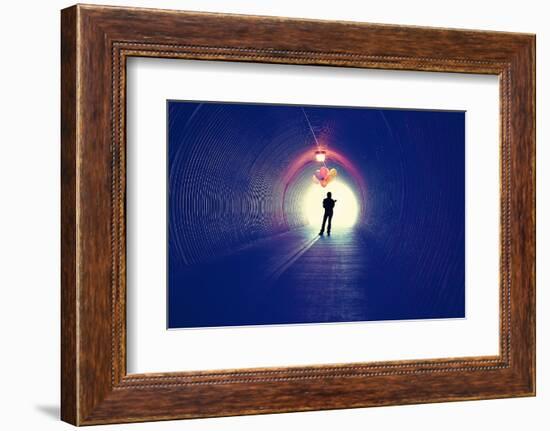 A Girl at the End of a Tunnel Holding Balloons-graphicphoto-Framed Photographic Print