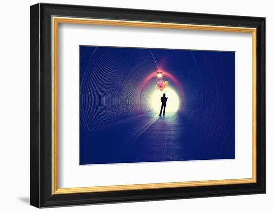 A Girl at the End of a Tunnel Holding Balloons-graphicphoto-Framed Photographic Print