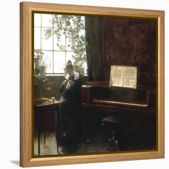 A Girl Knitting by the Window-Carl Holsoe-Framed Premier Image Canvas