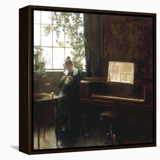 A Girl Knitting by the Window-Carl Holsoe-Framed Premier Image Canvas