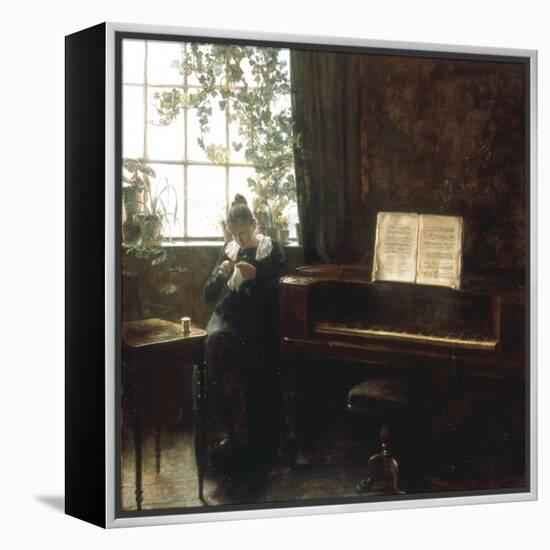 A Girl Knitting by the Window-Carl Holsoe-Framed Premier Image Canvas