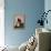 A Girl Rests on a Boat Below the Chinese National Flag-null-Framed Premier Image Canvas displayed on a wall