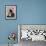 A Girl Rests on a Boat Below the Chinese National Flag-null-Framed Photographic Print displayed on a wall