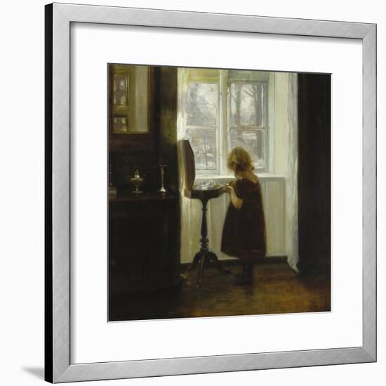 A Girl Standing by a Sewing Table-Carl Holsoe-Framed Giclee Print