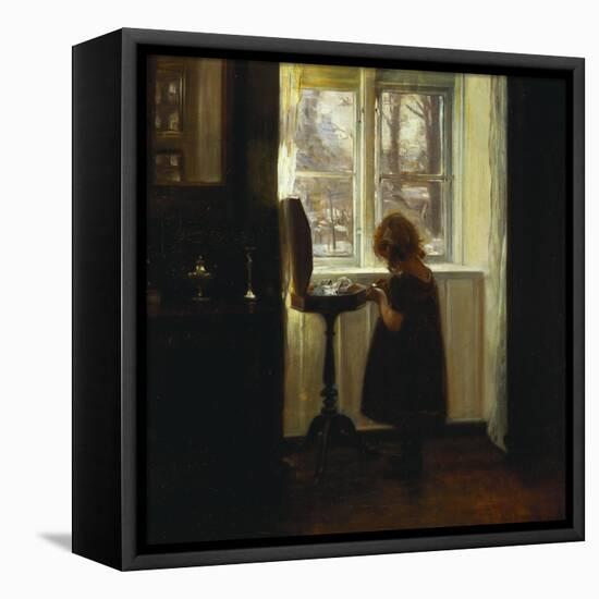 A Girl Standing by a Sewing Table-Carl Holsoe-Framed Premier Image Canvas