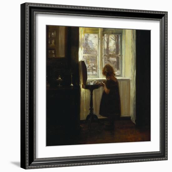 A Girl Standing by a Sewing Table-Carl Holsoe-Framed Giclee Print