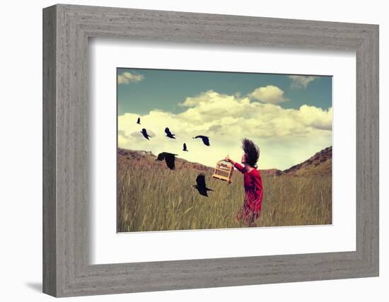 A Girl Walking through a Field with a Flock of Ravens or Crows Toned with a Retro Vintage Instagram-Annette Shaff-Framed Photographic Print