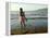 A Girl Walks on the Beach in Jacmel, Haiti, in This February 5, 2001-Lynne Sladky-Framed Premier Image Canvas