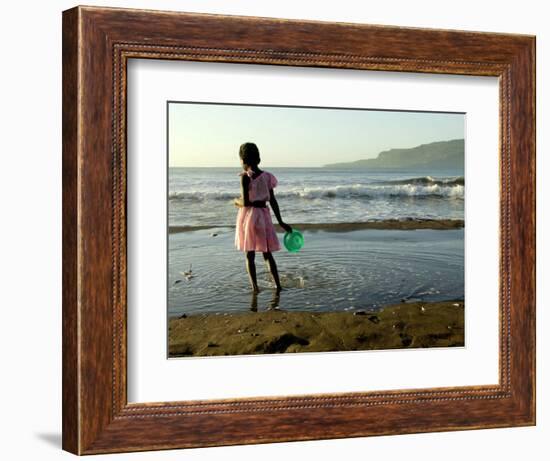 A Girl Walks on the Beach in Jacmel, Haiti, in This February 5, 2001-Lynne Sladky-Framed Photographic Print